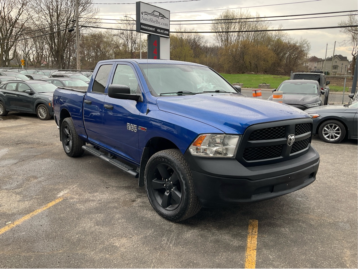 Blue 2016 RAM 1500 Pickup Truck Four-Wheel Drive Automatic